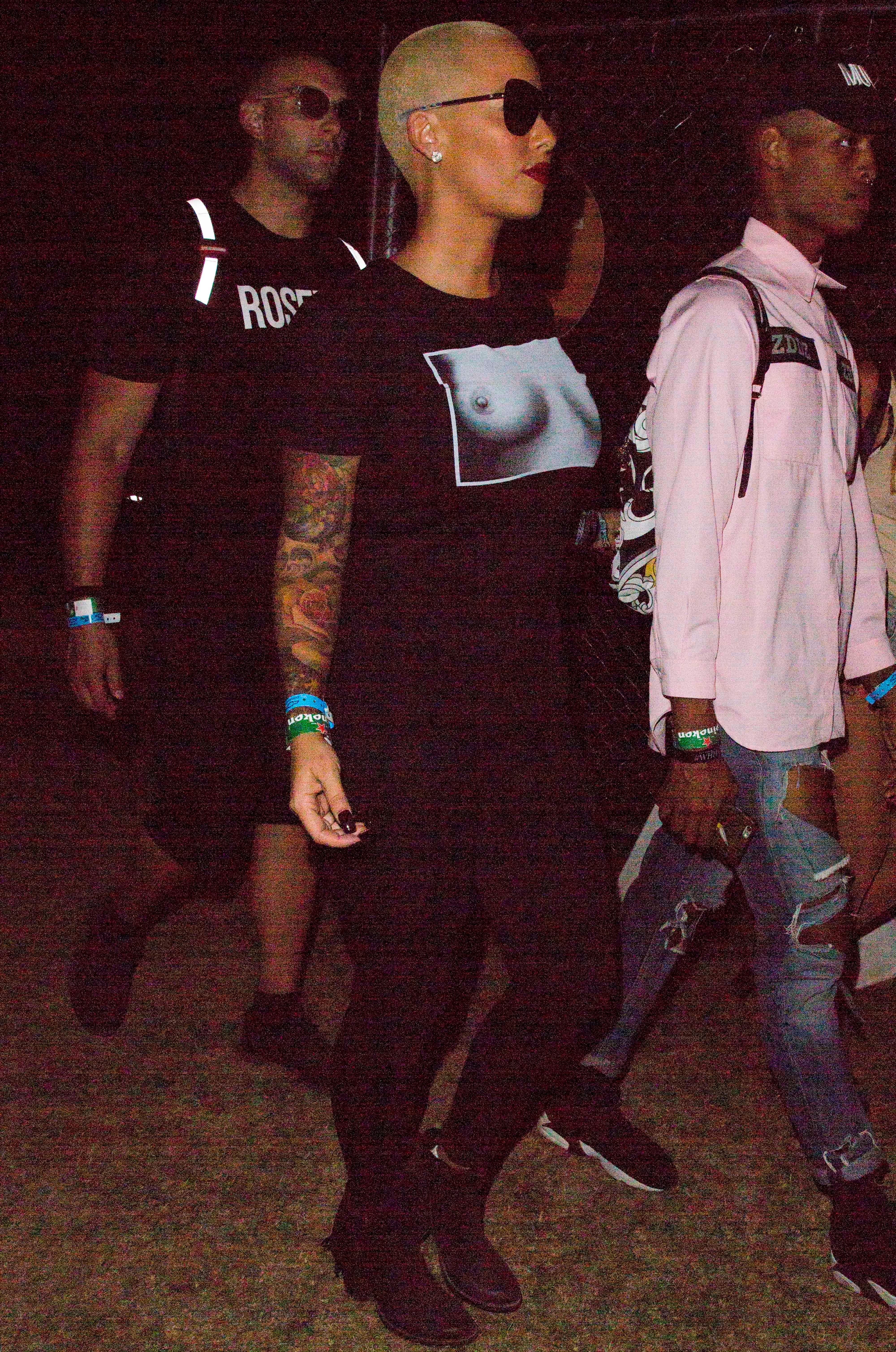 Amber Rose arrives at Guns N&#8217; Roses Coachella set wearing risque t shirt