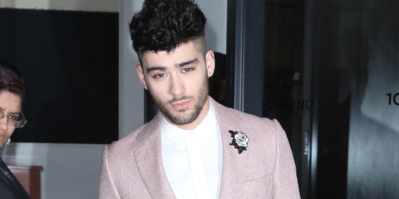 Zayn Malik heads to the Grammys sporting a white flower for #TimesUp