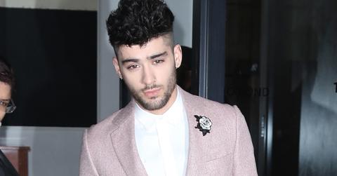 Zayn Malik heads to the Grammys sporting a white flower for #TimesUp