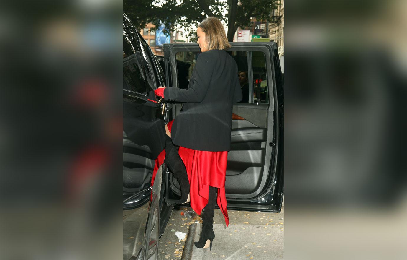 Chrissy Teigen in red Dress and Thigh High Boots