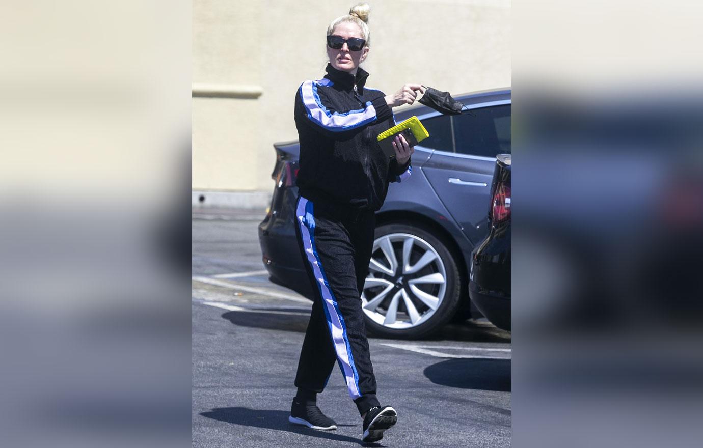 erika jayne ditches glam casual tracksuit ex tom girardi embezzlement lawsuit