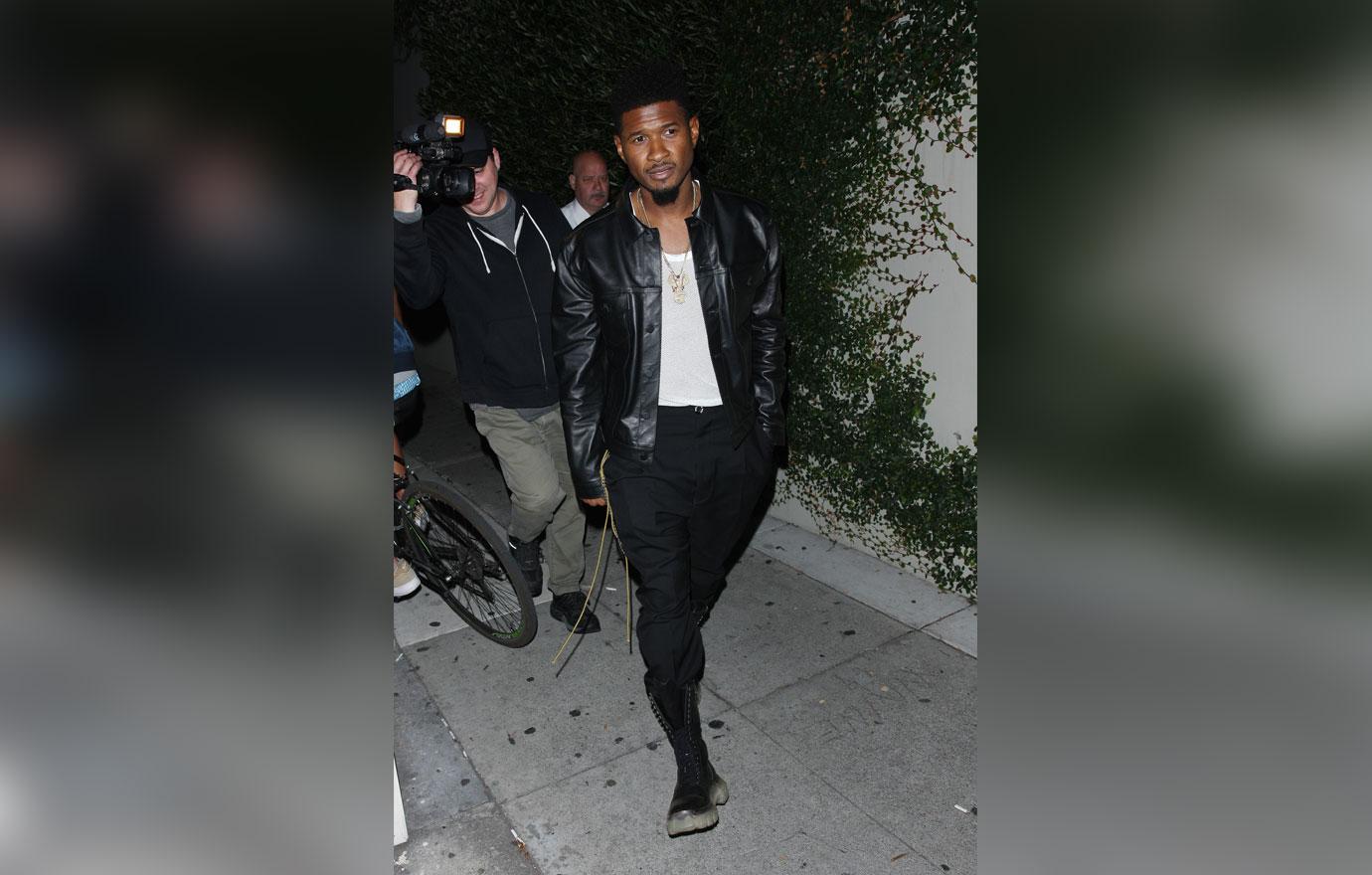 Usher is seen leaving Ysabel restaurant with two female companions after attending P Diddy&#8217;s 49th birthday party