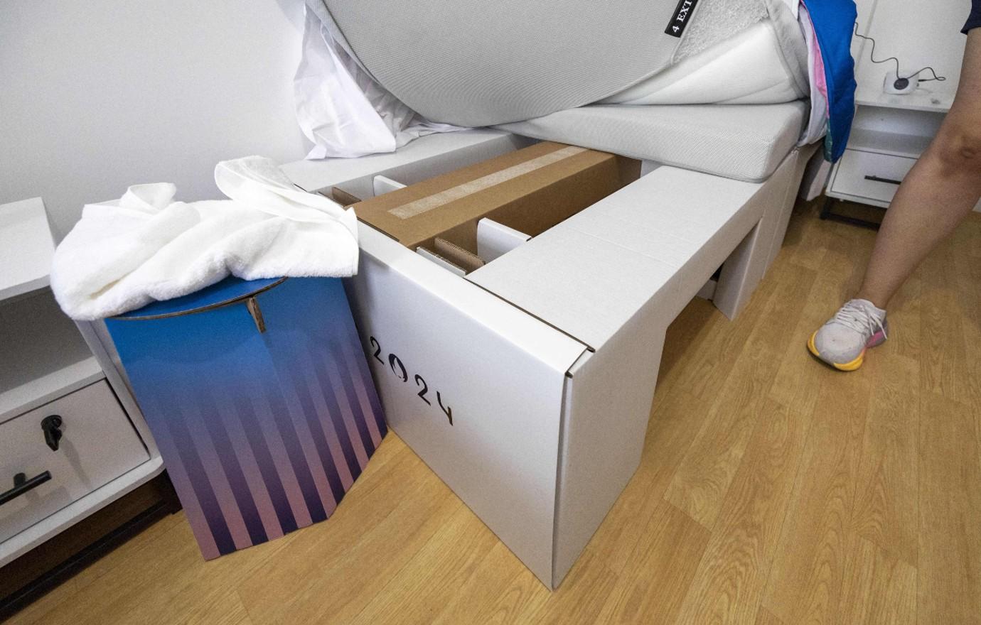 olympic village sprinter kendall ellis team usa cardboard beds dorm