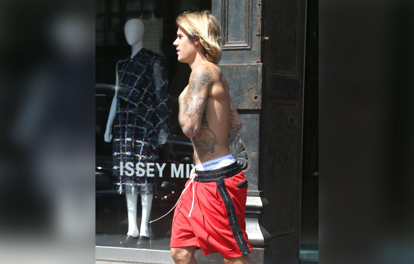 Justin bieber bares chest tattoos shirtless in NYC 1