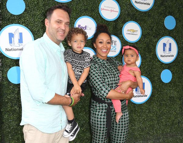 Tamera mowry adam housley cuddle aden ariah 03