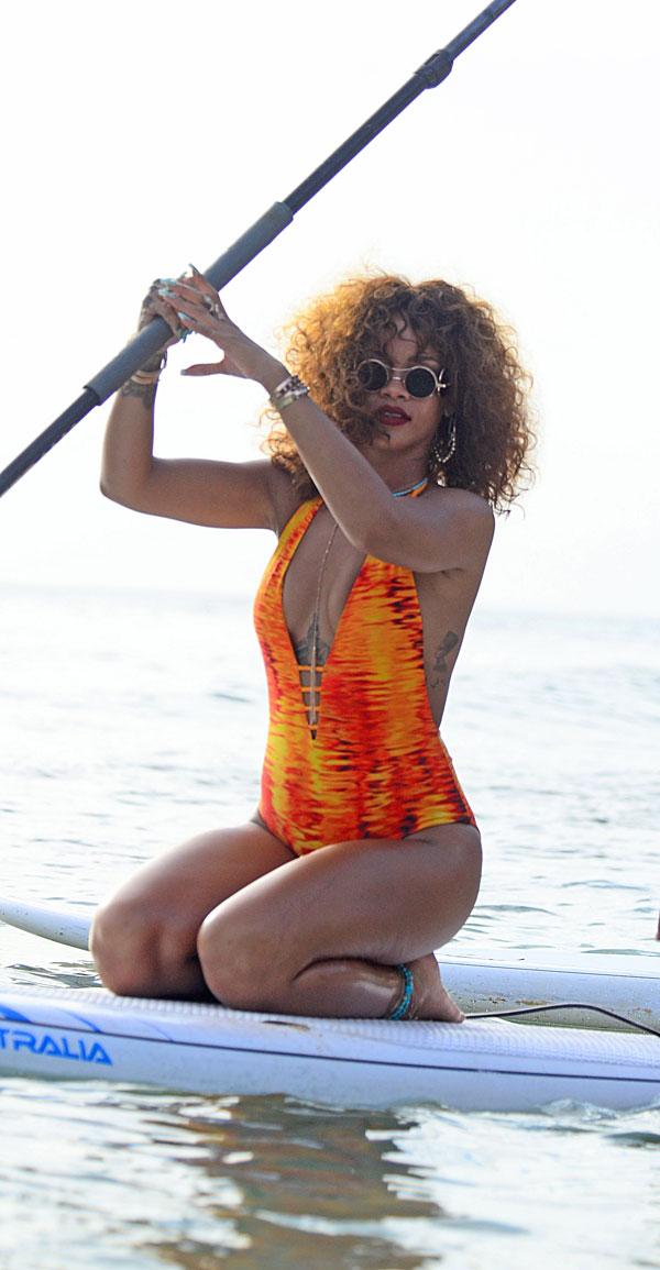 Rihanna swimsuit paddleboarding photos 06