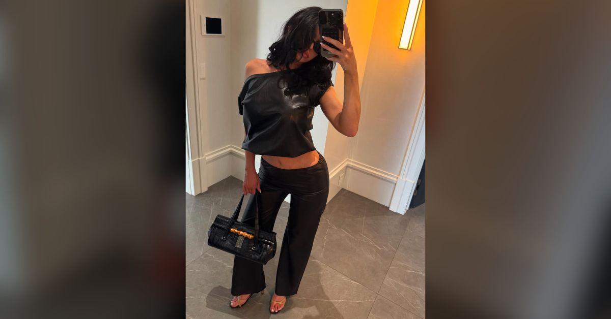 Image of Kylie Jenner snapped a selfie in the mirror before leaving her house.