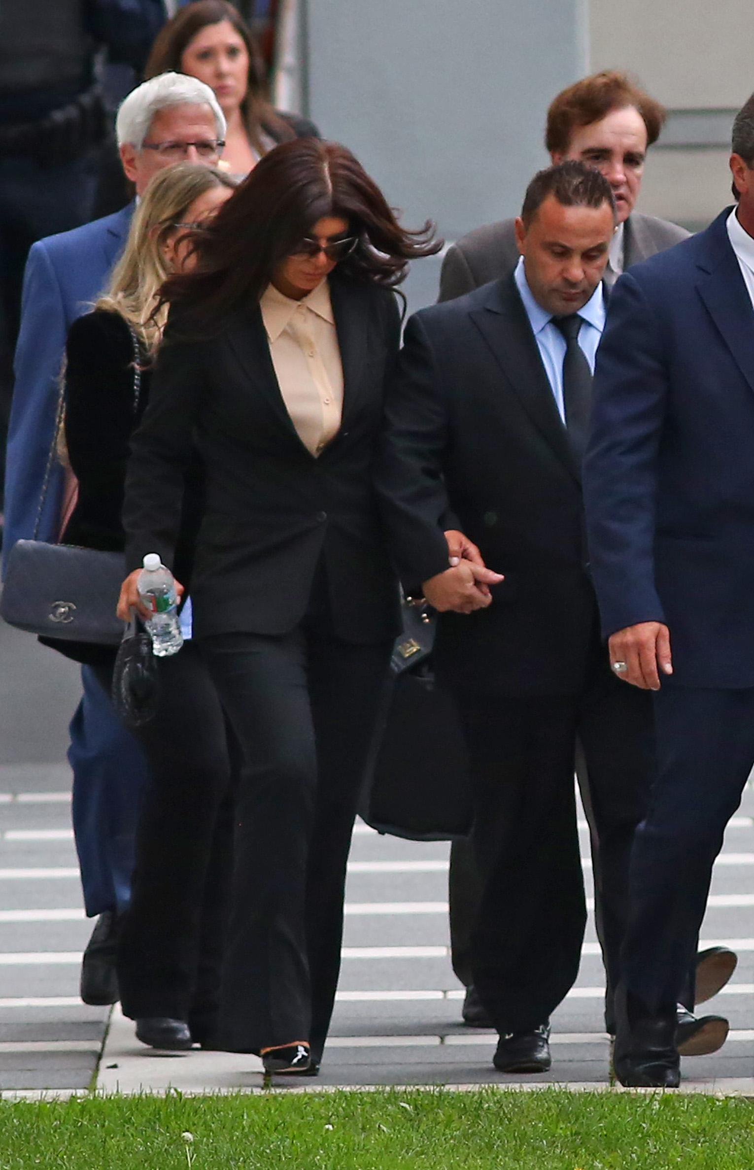 Teresa Giudice and her husband Joe Giudice leaving federal court today in Newark, NJ