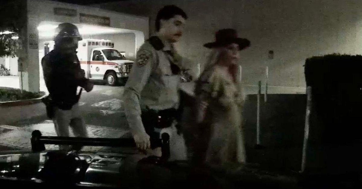 Image of Britney Spears reportedly received a 'courtesy call' from authorities after photos allegedly showed her standing through the sunroof of an SUV.