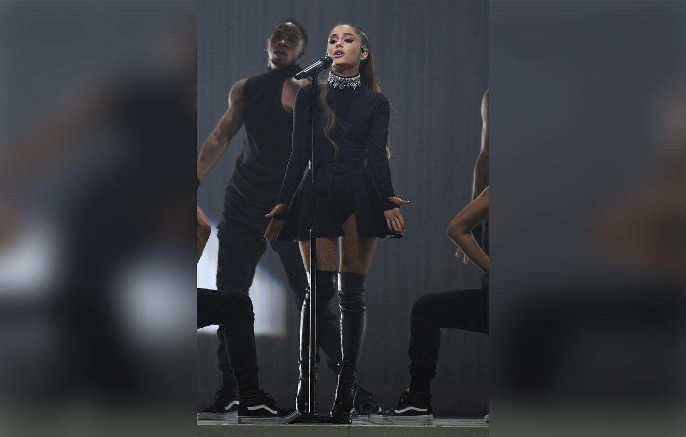 Ariana grande in black dress performing