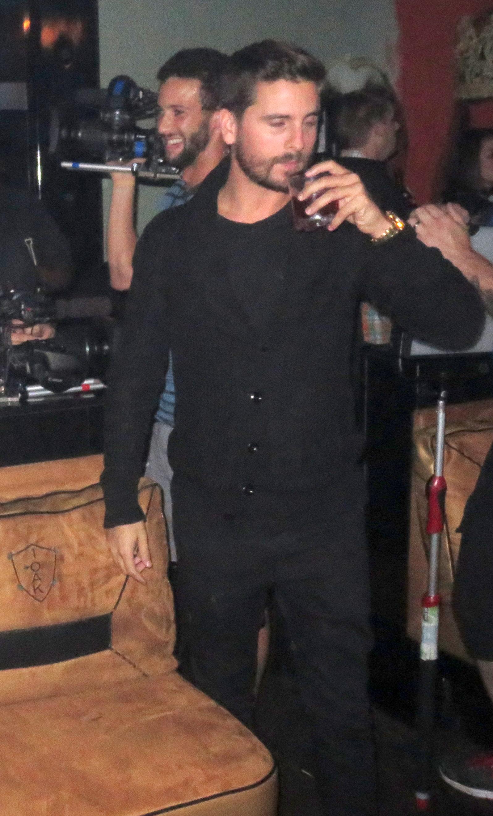 EXCLUSIVE: Scott Disick parties late at night in Las Vegas with his entourage and friends