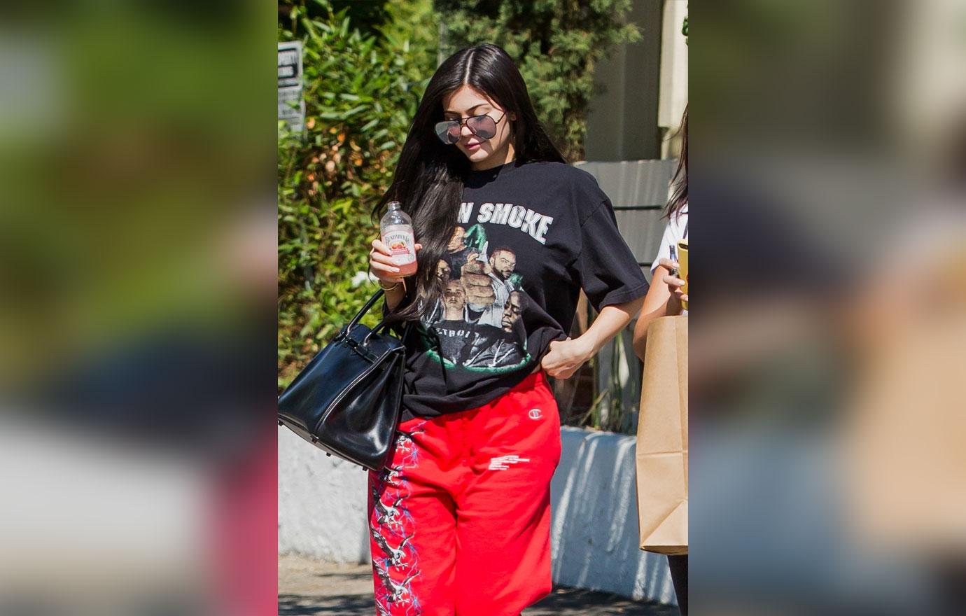 *EXCLUSIVE* Kylie Jenner wears red slippers and weed tee shirt