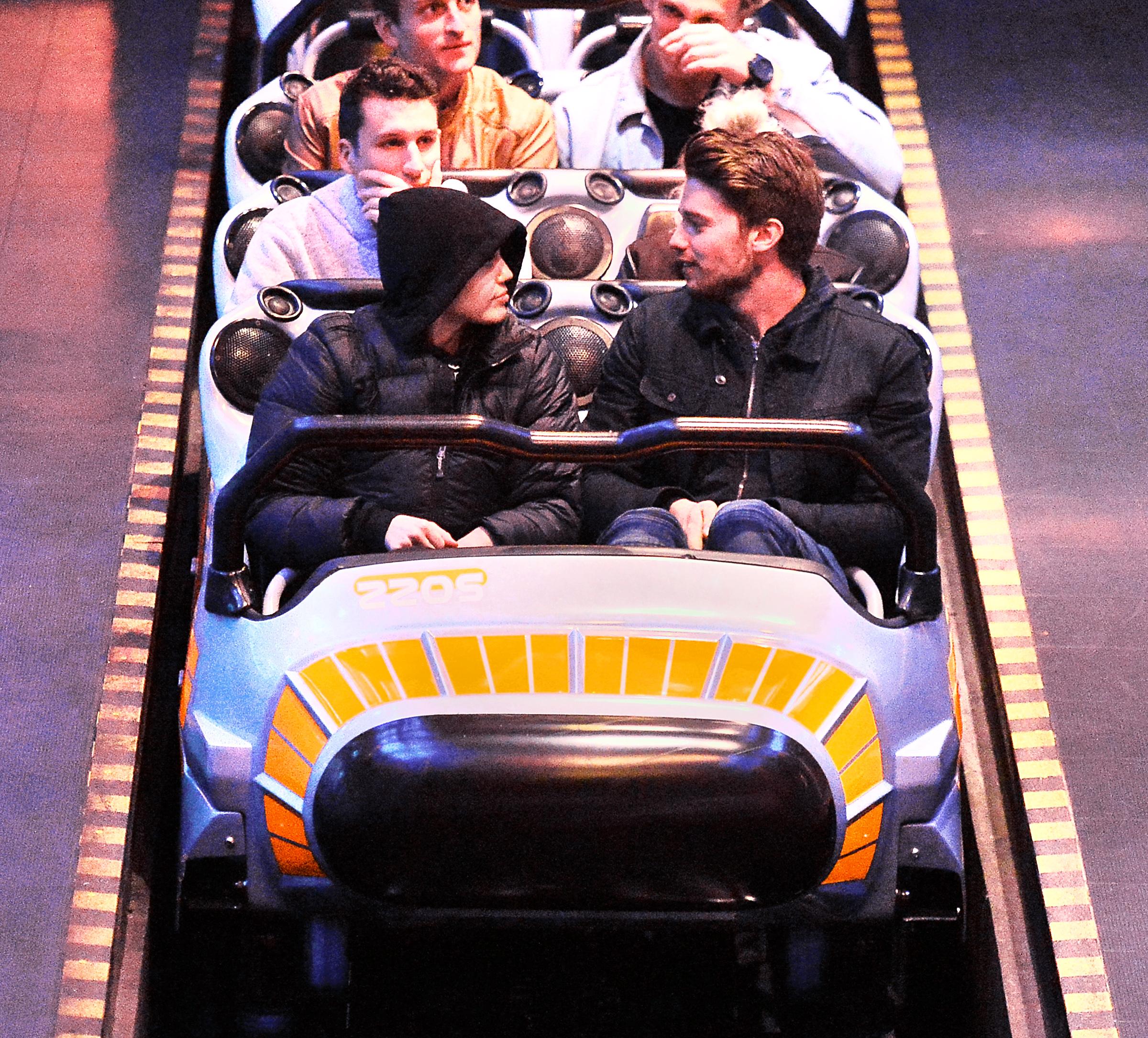 EXCLUSIVE: *PREMIUM RATES APPLY*NO WEB* Miley Cyrus and boyfriend Patrick Schwarzenegger enjoy a date night at Disneyland in Anaheim, CA.