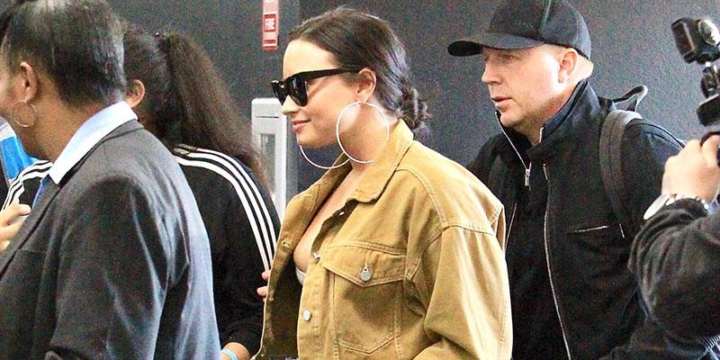 Demi Lovato Lets The Girls Hang Out With A Nip Slip At LAX