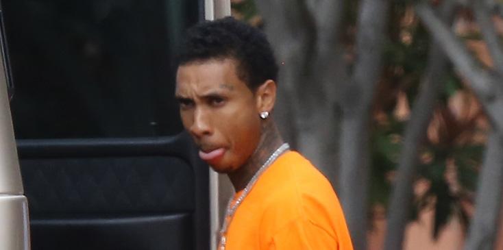 *EXCLUSIVE* Tyga jumps on the passanger seat following his late night arrest