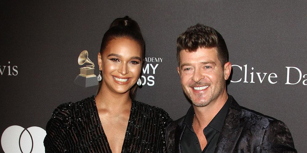 Robin Thicke posts pic of wife's near nip slip days after