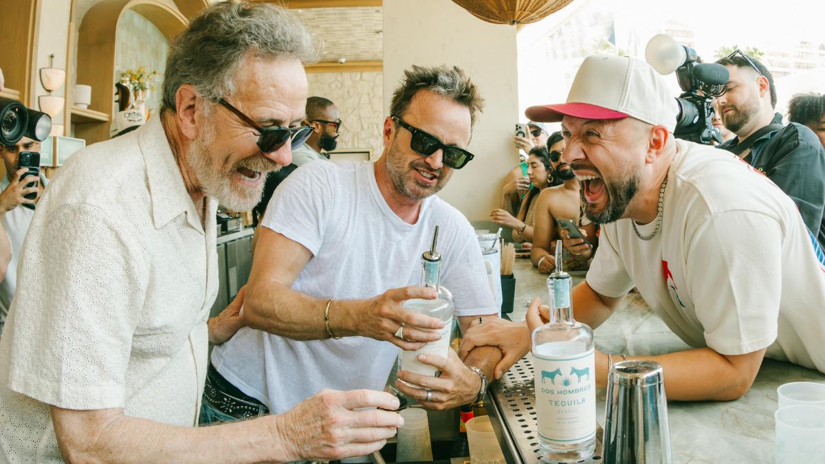 breaking bad reunion bryan cranston aaron paul get behind the bar and the dj booth for wild tequila bash in vegas