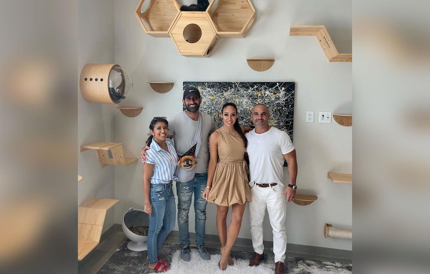 family karma stars richa sadana and vishal parvani with melissa and joe gorga inside catopia by jason gluck at furry friends adoption clinic and ranch photo courtesy vishal parvani