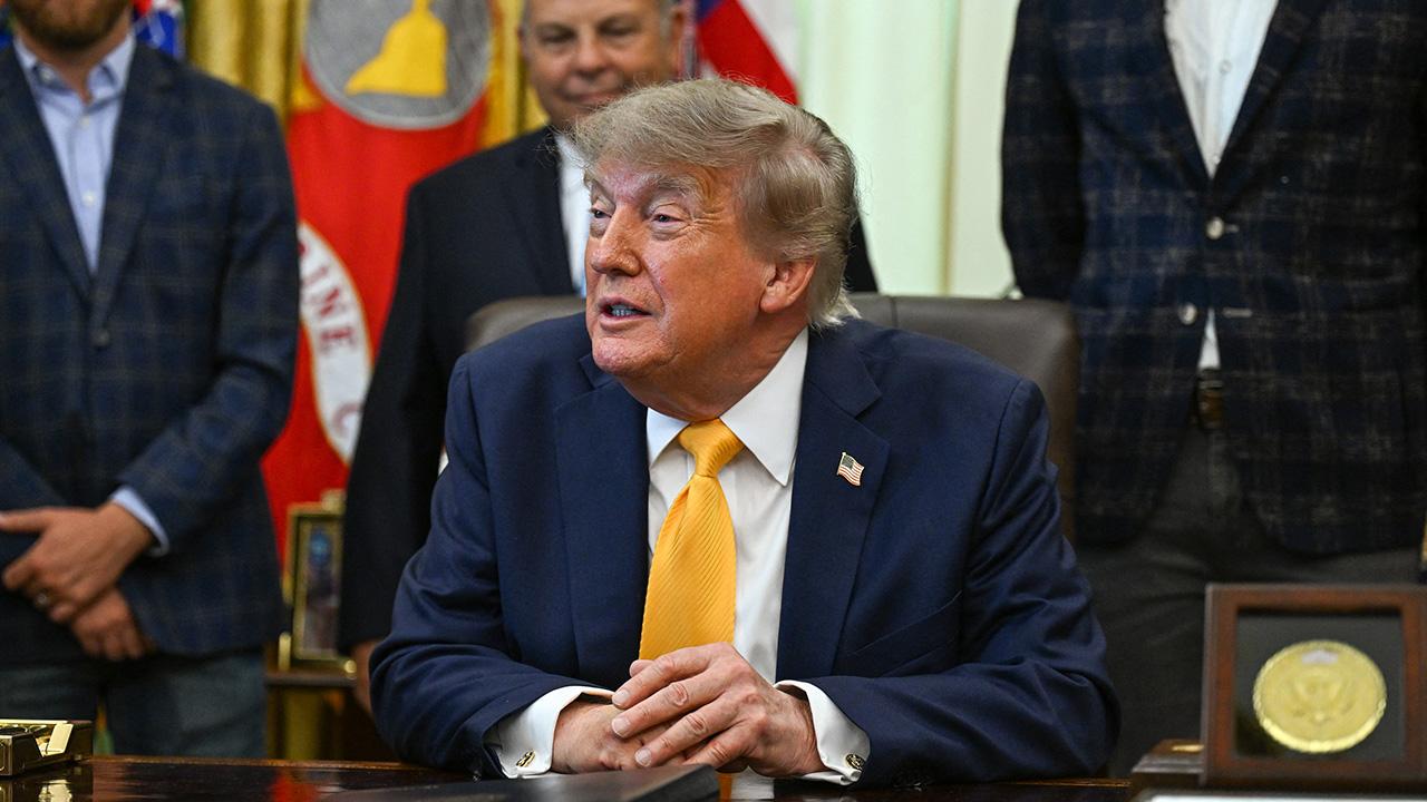photo of Donald Trump has called out the reporter for not smiling while she's on the job.