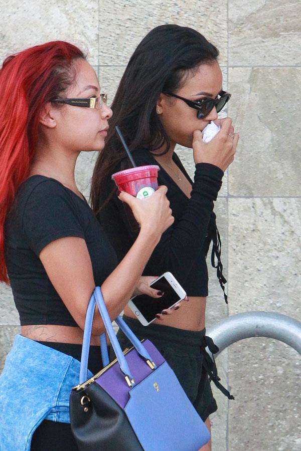 Karrueche trna swollen face boobs legs 02