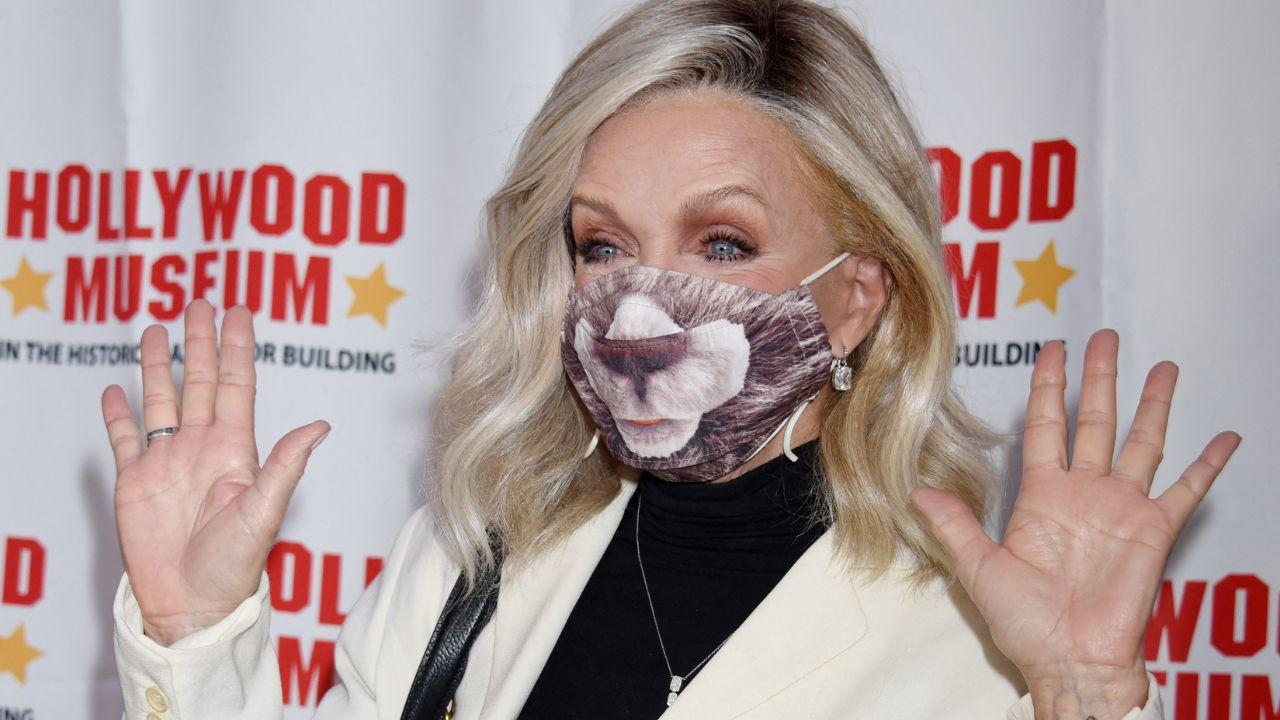 Image of Mills wearing a mask.