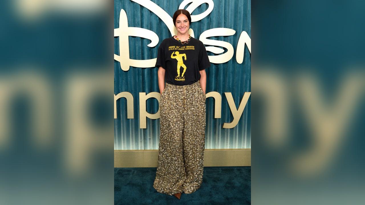 Image of Shailene Woodley gave her Emmys look a casual makeover by pairing her glittering pants with a graphic T-shirt for the after-party.