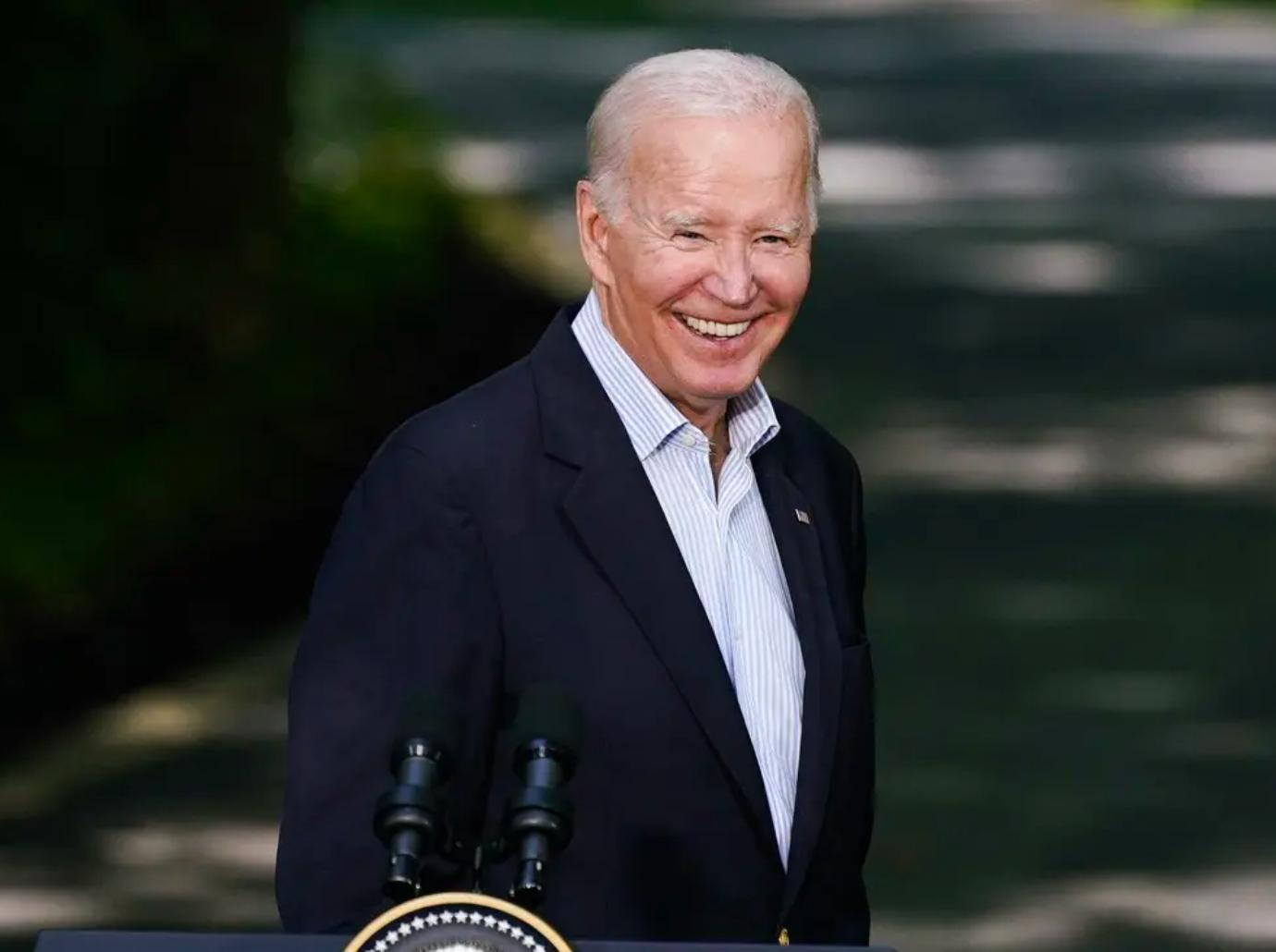 president joe biden coughing shaking students hands