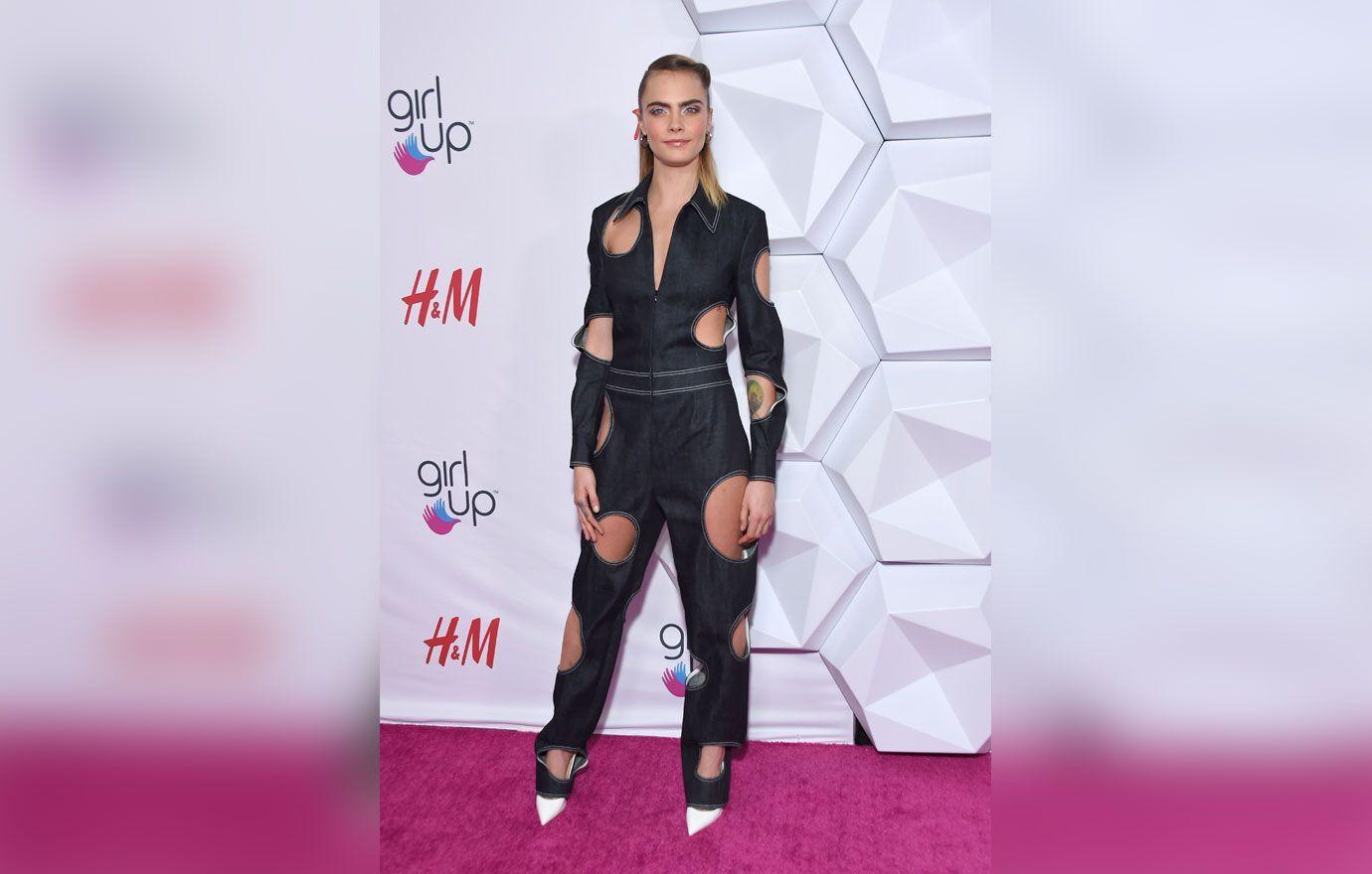 https://media.okmagazine.com/brand-img/exQ_iCKoS/0x0/cara-posing-black-1664640112109.jpg