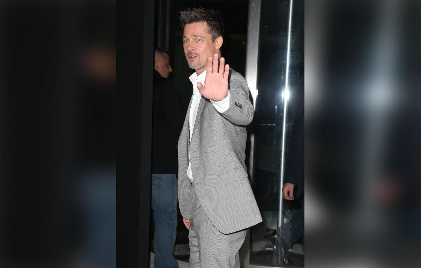 Brad Pitt waving