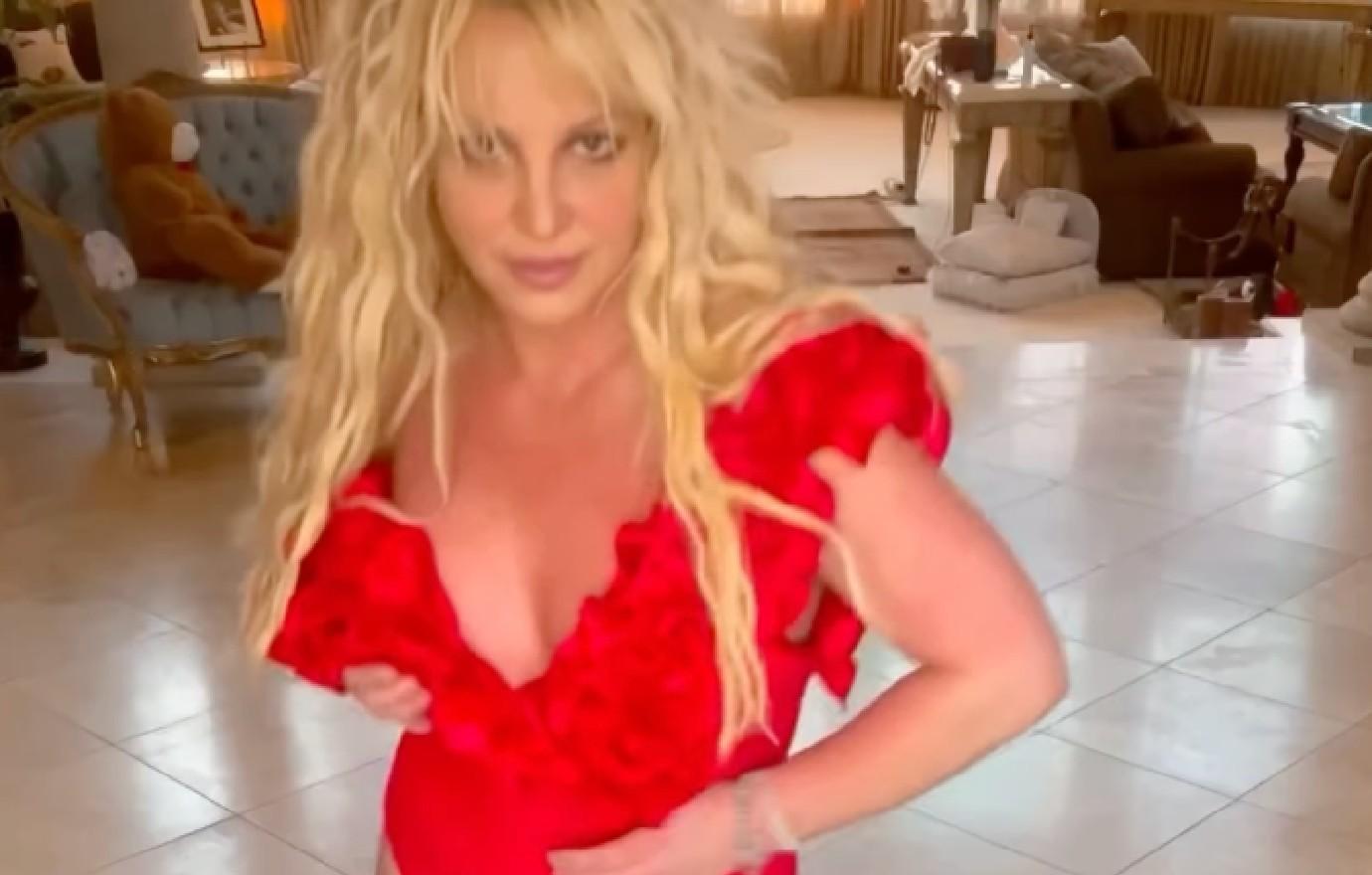 britney spears concern posting deleting racy photo cleavage she ok