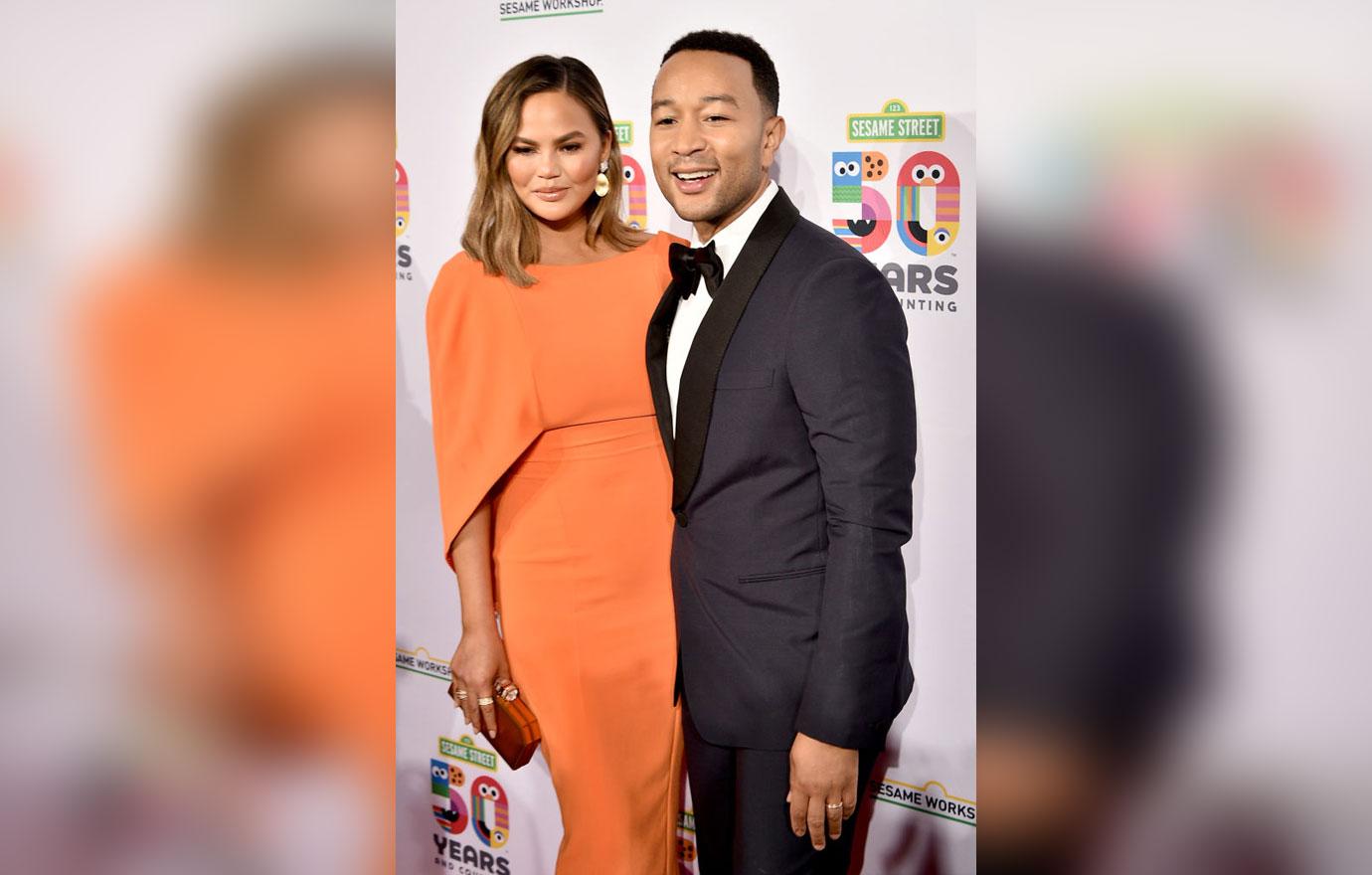 Chrissy Teigen And John Legend Pose