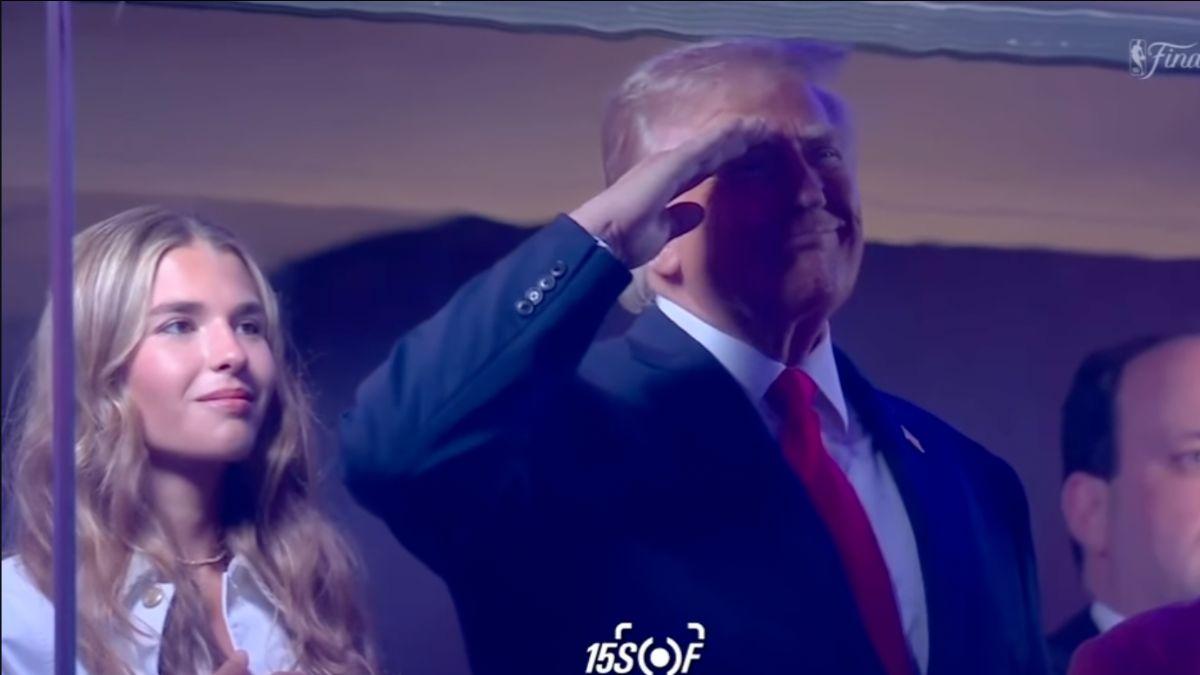 Image of The crowd booed the president during the game.