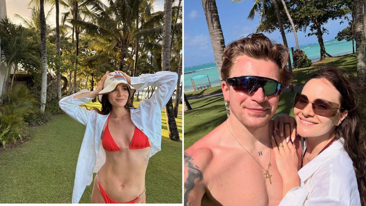 image of Adam Peaty went shirtless in black swim trunks while strolling through the scenic hotel grounds.