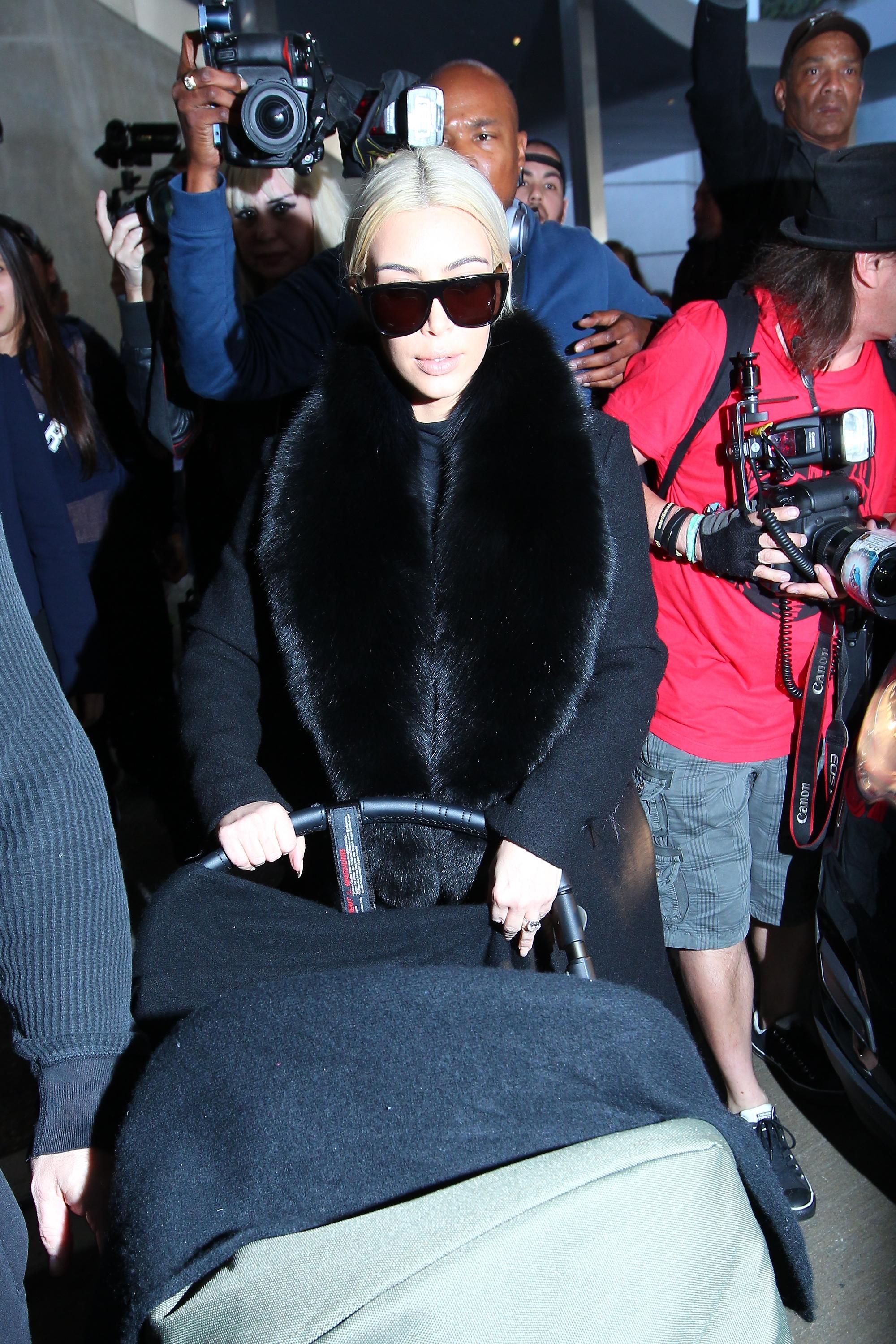 Kim Kardashian and North West at LAX