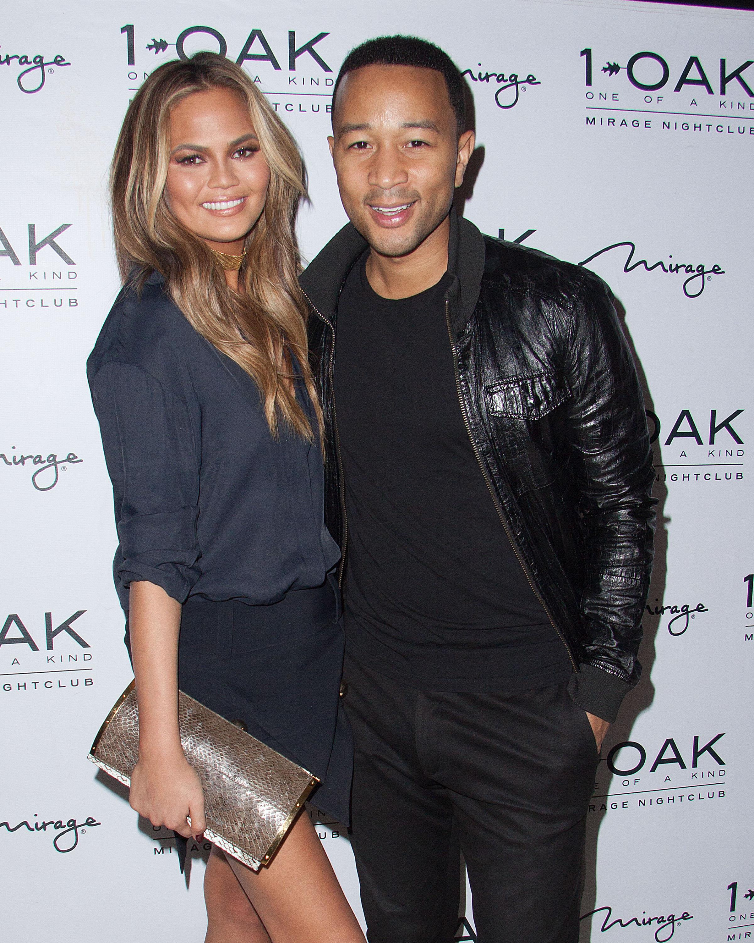 Chrissy Teigen and John Legend at the Pre Billboard Music Awards party at 1 OAK Nightclub in Las Vegas