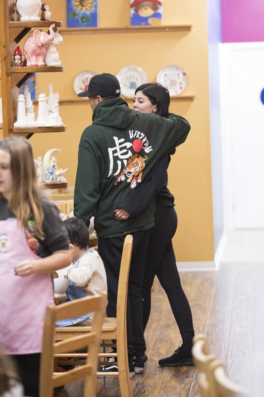 Kylie Jenner and Tyga make out in front of children at Color Me Mine