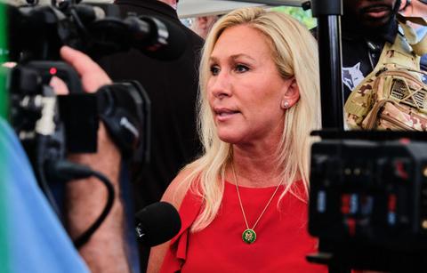 marjorie taylor greene mocked trying hug donald trump cringe