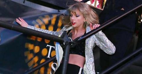 Taylor Swift slips coming down the stairs after her New Year’s Eve performance, then recovers smoothly, and giggles in embarrassment in Times Square, NYC