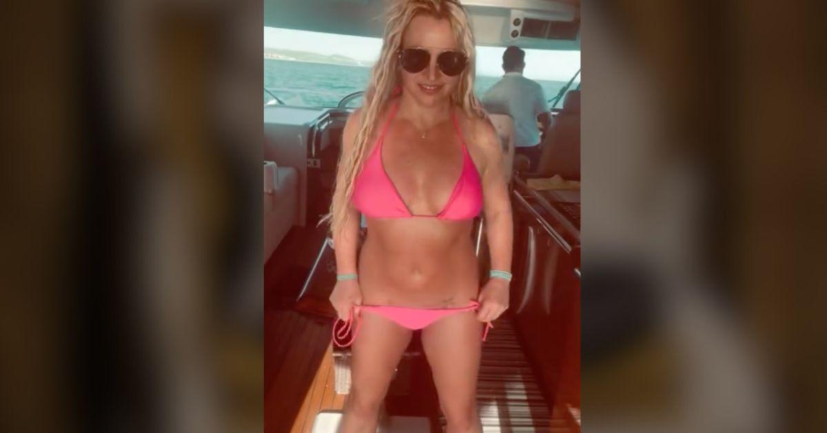 image of The pop star's assets was seen hanging out of her dress.