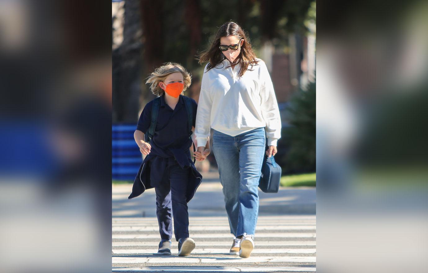 jennifer garner picks up son samuel from school while romance john miller gets serious