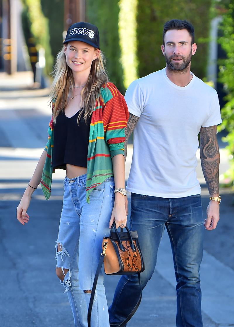 EXCLUSIVE: Adam Levine and his wife Behati Prinsloo look very happy as they head to a Rolls Royce dealership in Beverly Hills