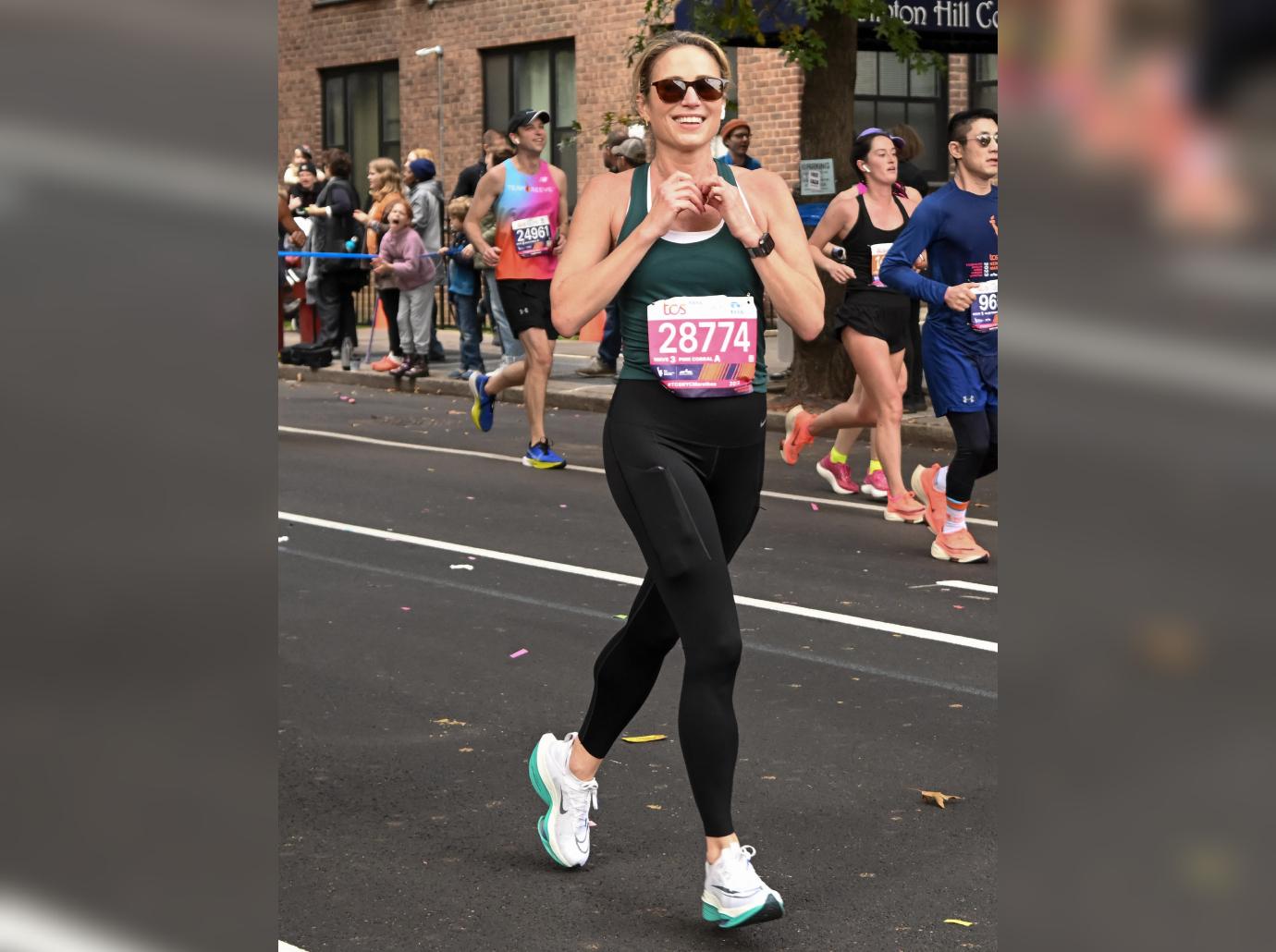 Amy Robach & T.J. Holmes Run NYC Marathon Together: Photos