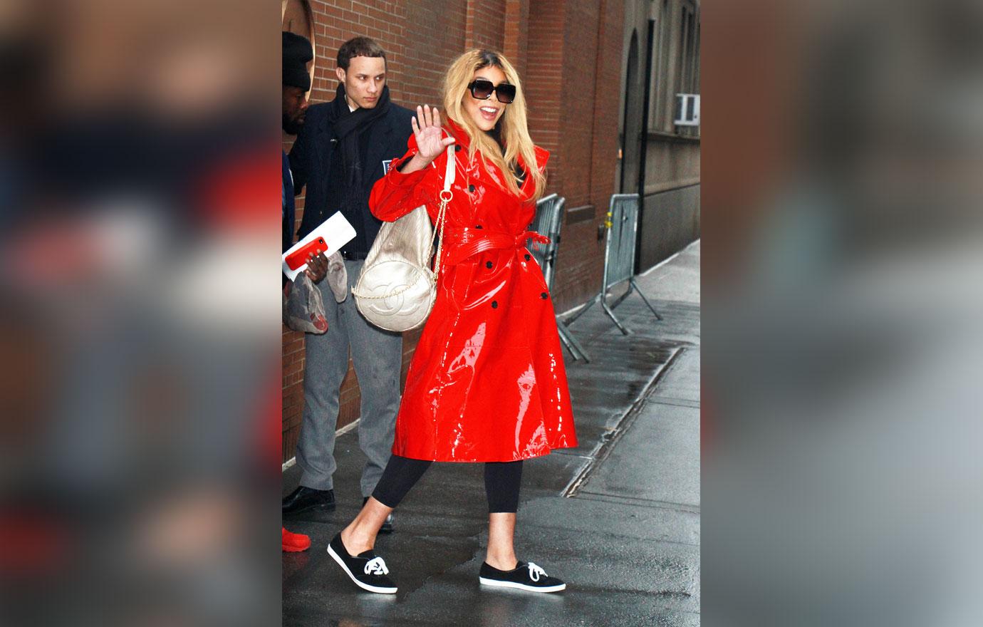 Wendy Williams Wearing red Trench Coat Outside of The View