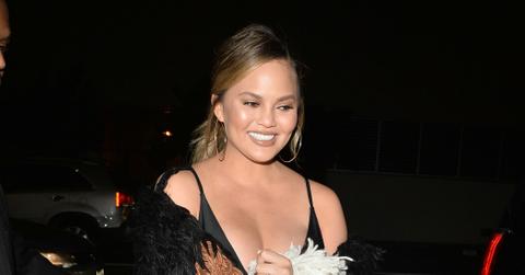 Chrissy Teigen Busty Chest Revolve Launch Party Photos hero22