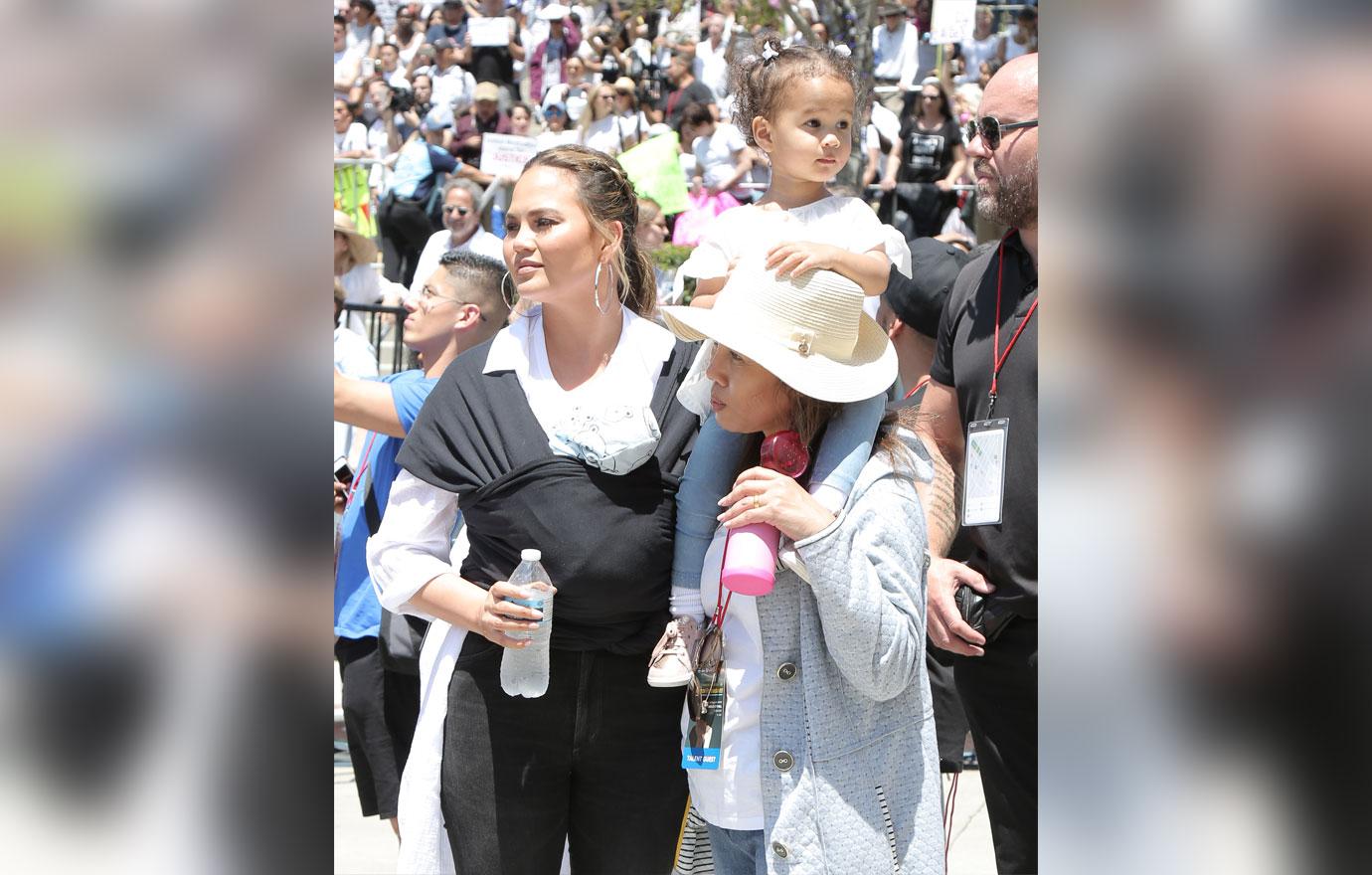 John Legend and Chrissy Teigen bring newborn son to &#8216;Families Belong Together&#8217; March in LA