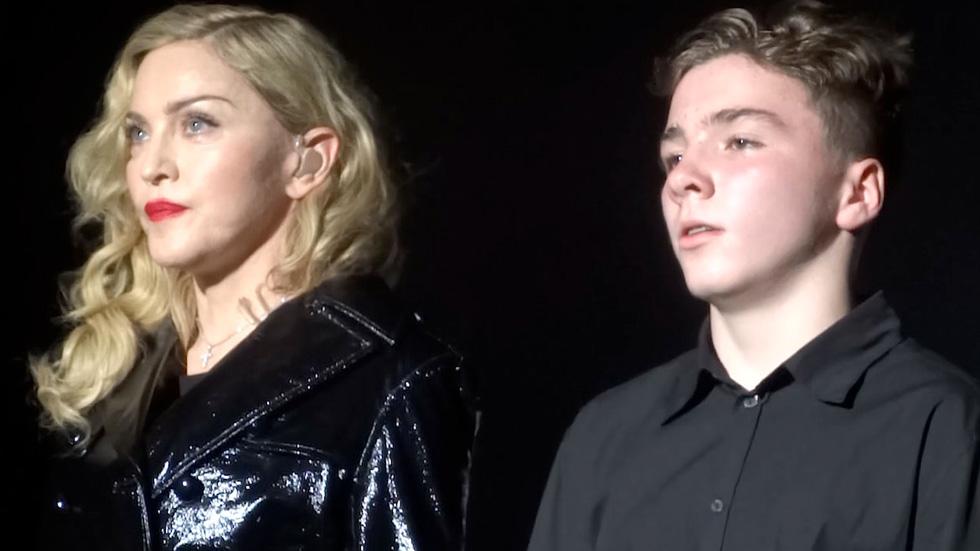 Madonna and son Rocco Ritchie perform at a film premiere