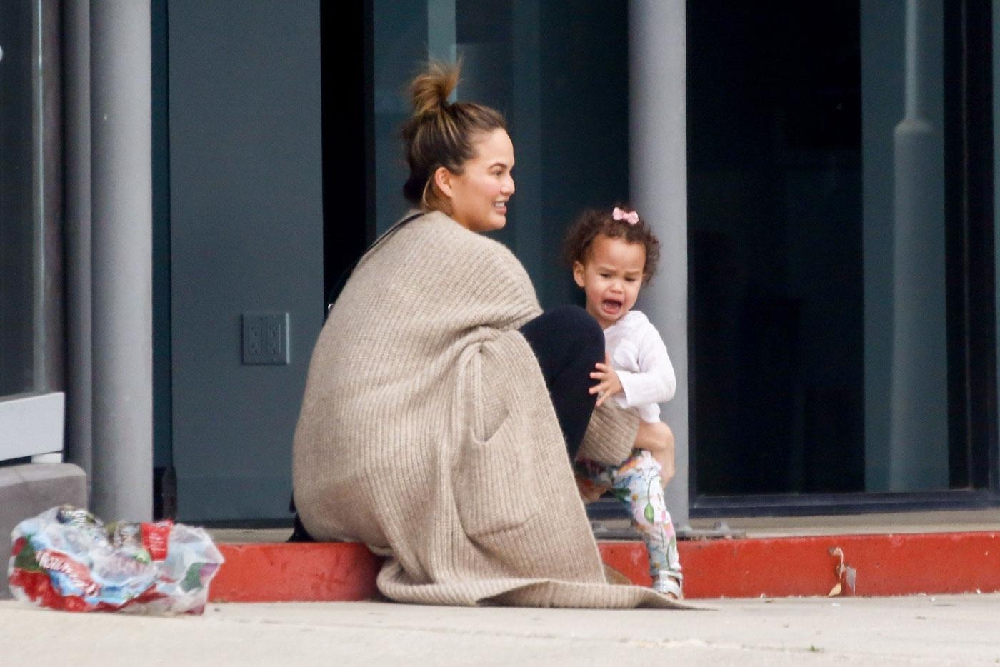 *EXCLUSIVE* Chrissy Teigen and John Legend shop at PC Greens with a cranky Luna