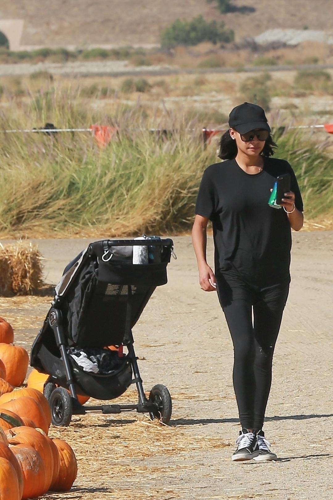 Naya Rivera and Ryan Dorsey take their son to Underwood family Farms to pick out a pumpkin