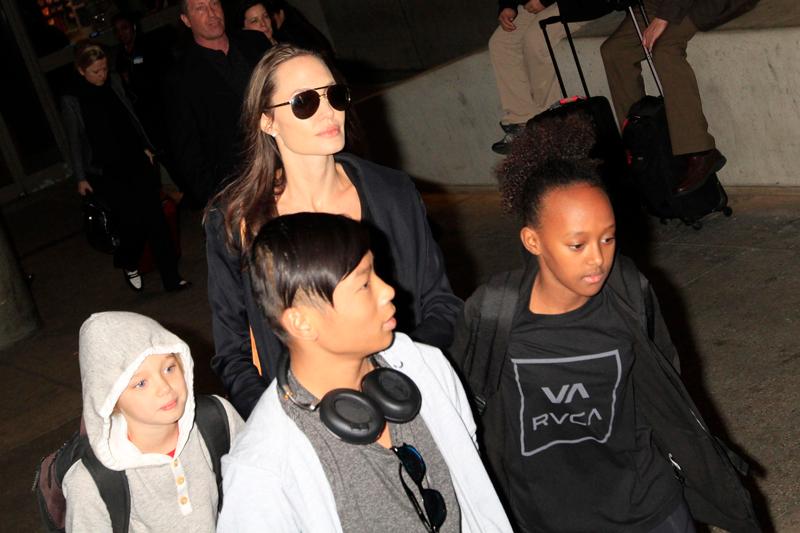 Angelina Jolie and her children arrive in Los Angeles.  Jolie was seen with her kids, Shiloh, Maddox &amp; Zahara.