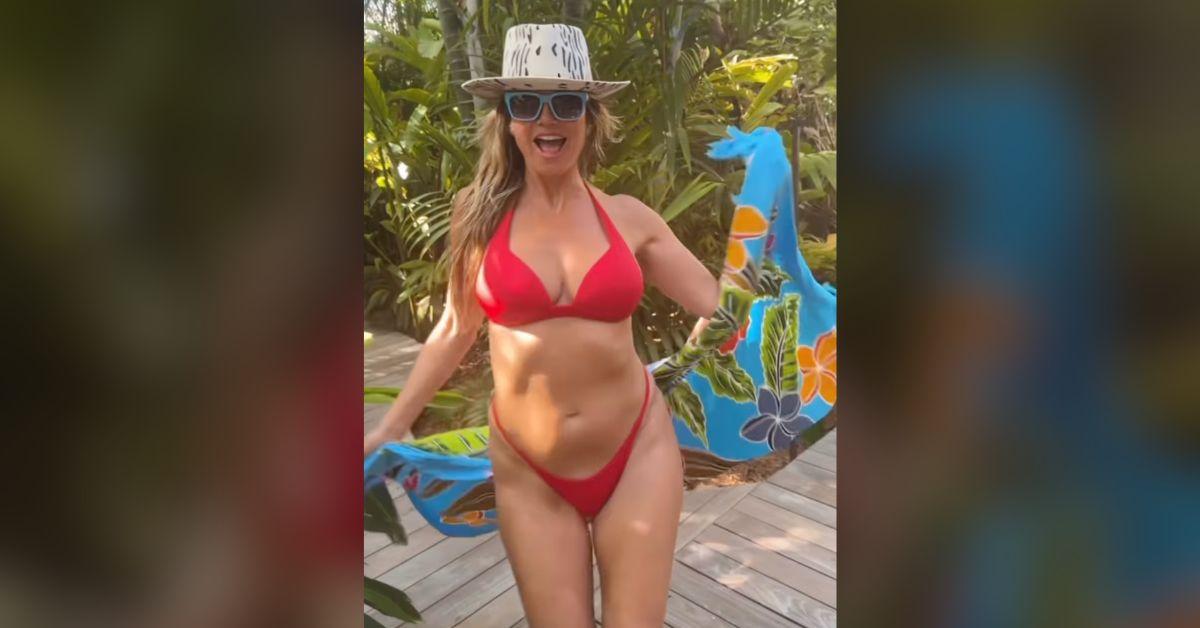 heidi klum turns heads fiery red bikini vacation watch